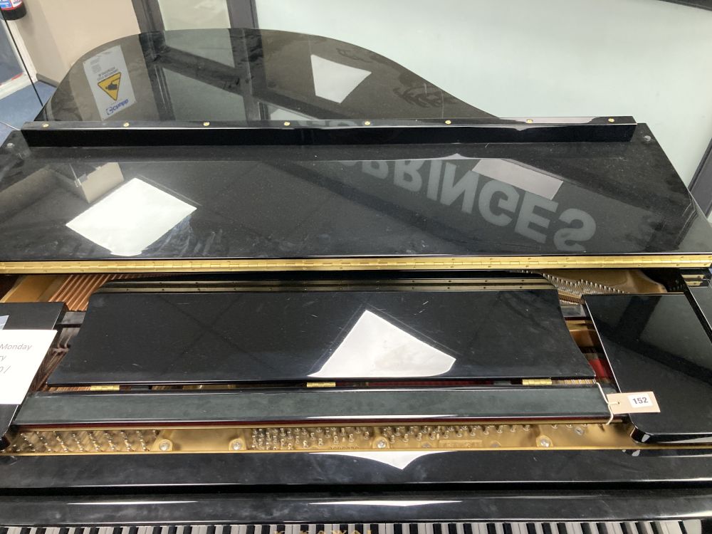 A Kawai baby grand piano, in a bright polyester finish case, on square tapered legs, together with matching adjustable stool